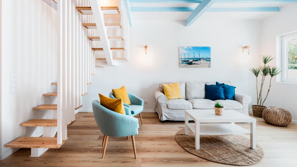 Fotografia apresentando o Sala de estar no projeto Casas da Costa, localizado em Almada, Portugal.