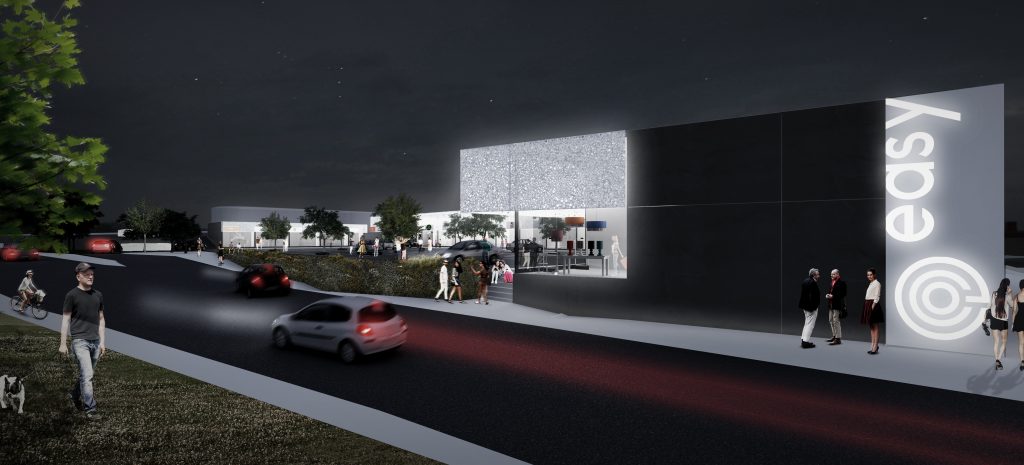 Imagem tridimensional apresentando o conceito de Perspetiva exterior da fachada de noite no projeto Franca Strip Mall, localizado em São Paulo, Brasil.